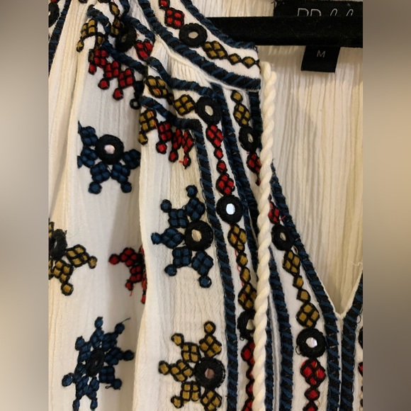 Off white top with navy and red embroidery. Size medium - Picture 2 of 4